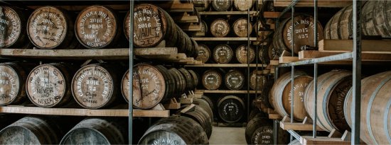 Cardrona Distillery maturing casks in warehouse. Cardrona Distillery maturing casks in warehouse.