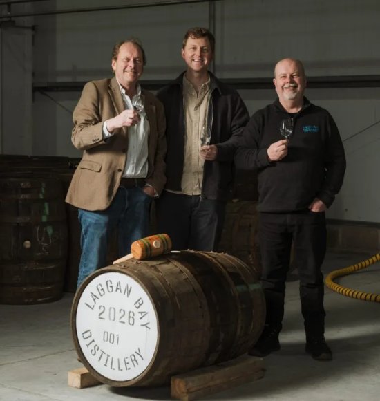 The first Laggan Bay cask. L to R Leonard Russell, Tom Russell, and Malcolm Rennie at the filling of the first cask