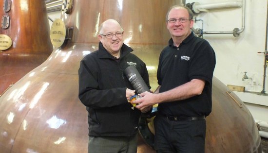Tamdhu distillery manger Sandy Coutts hands over to Sandy McIntyre.