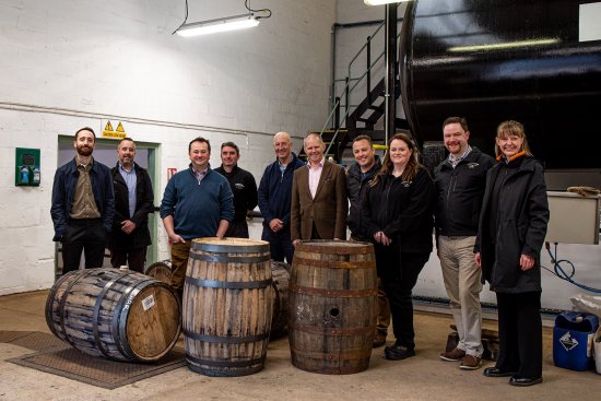 Whyte and Mackay Master Whisky Maker Gregg Glass (third from left) is joined by colleagues and members of the Scotch Whisky Association - including CEO Mark Kent (fifth from left) - at the filling of Scottish Oak barrels at the Tamnavulin distillery, Speyside.