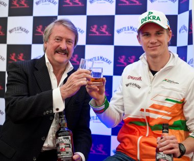 Richard Paterson and Nico Hülkenberg sample the specially crafted new bottling.